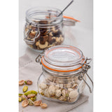 Clear KILNER Clip Square canning jar, glass storage container with metal clip lid, for preserving and storing food.