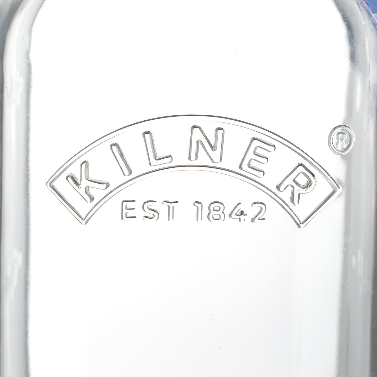 KILNER glass juice bottle with a screw cap, clear and cylindrical, suitable for storing homemade fruit juices or beverages.