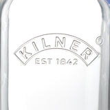 KILNER glass juice bottle with a screw cap, clear and cylindrical, suitable for storing homemade fruit juices or beverages.