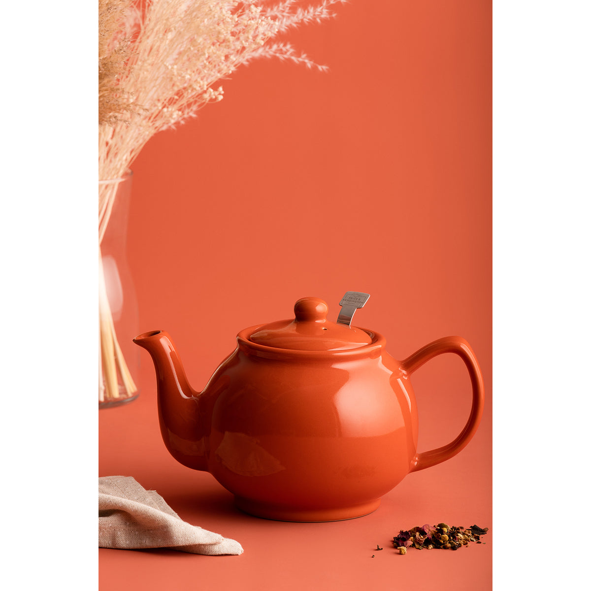 P & K Price & Kensington Teekanne teapot with orange design, ceramic vessel featuring a curved spout and handle.