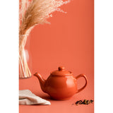 Teekanne orange tea kettle by P & K, with a glossy orange finish and classic teapots design.