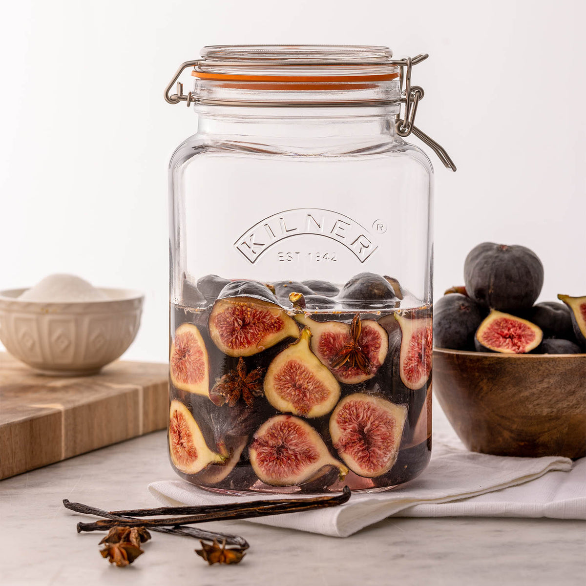 Clear KILNER Clip Square canning jar with metal clips and lid for preserving food and homemade jams.