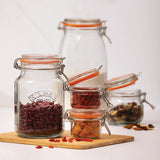 KILNER CLIP SQUARE clear glass jar for preserving and storing, with a secure clip lid, on a white background.