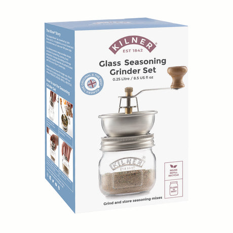 KILNER spice mill with clear glass body and black top, 250 ml capacity, for grinding various spices.