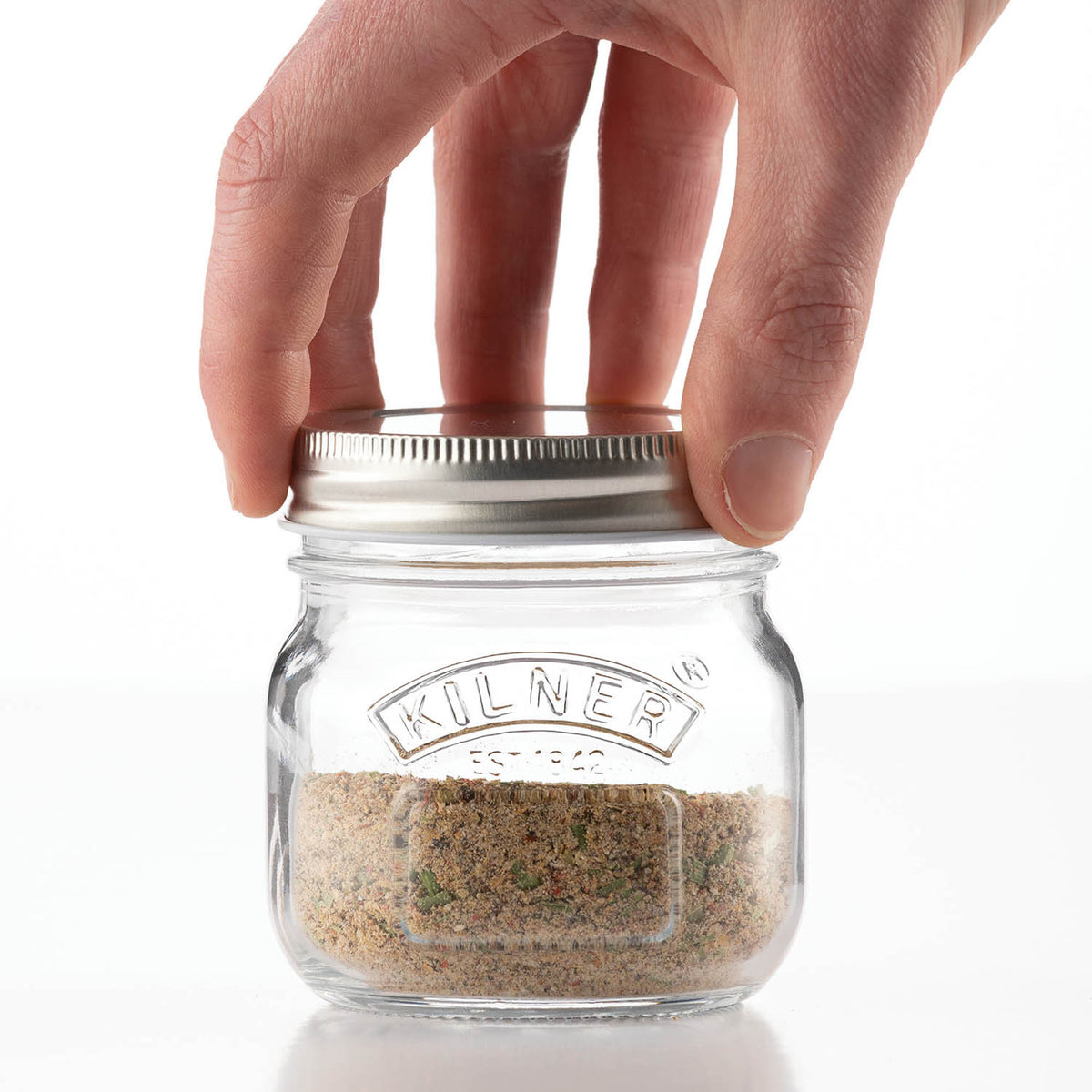 KILNER spice grinder in clear 250 ml jar, showing the sleek glass design and metal top for freshly ground spices.