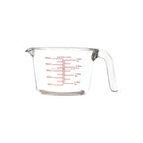 Clear Mason Cash classic measuring jug with measurement markings and handle, made of transparent plastic for precise liquid measurement.