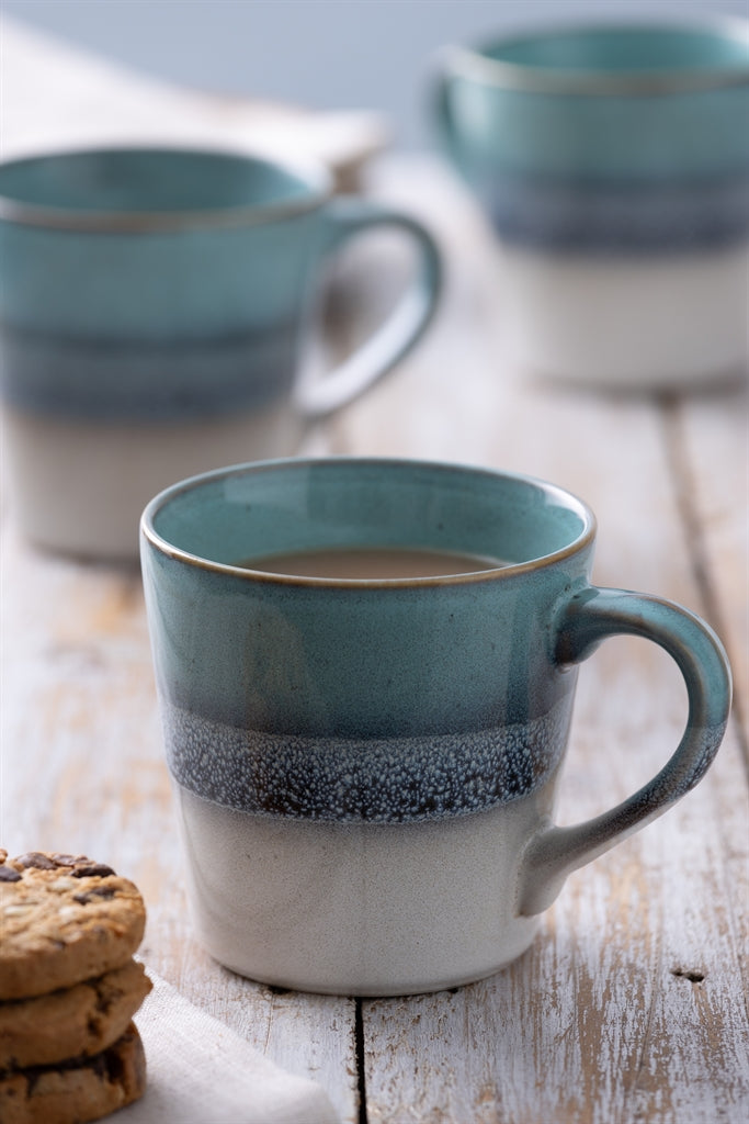 Blue Mason Cash ceramic mug with a smooth, rounded shape and classic design, perfect for hot beverages.