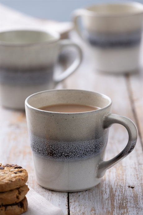 Beige Mason Cash ceramic mug with a smooth finish and classic design, ideal for hot beverages.