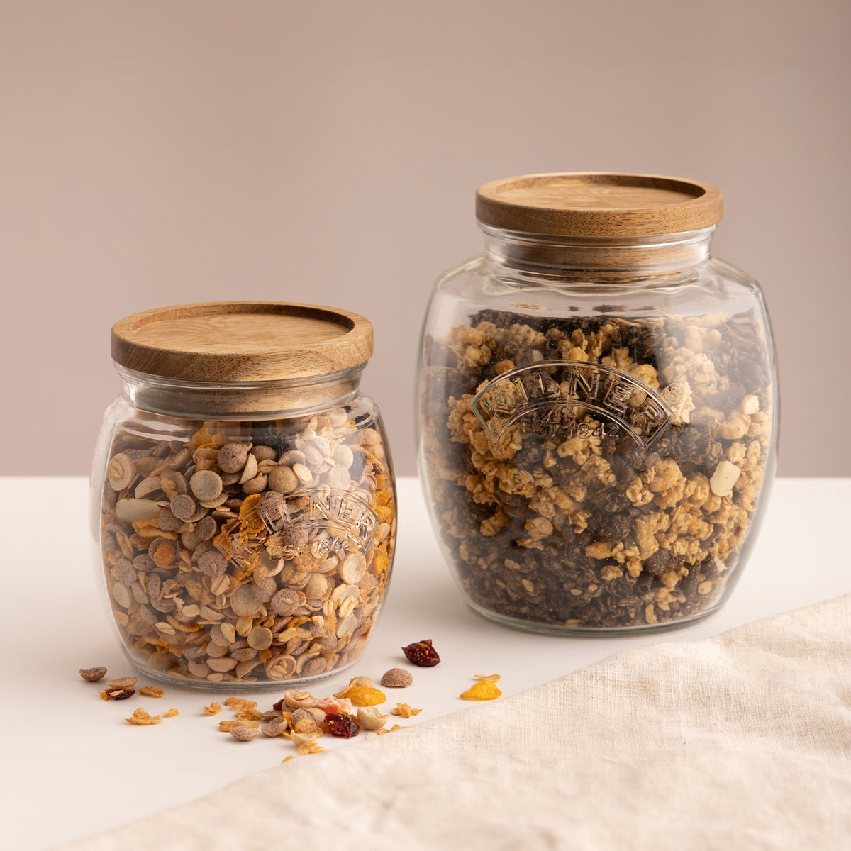 Kilner universal storage jar with clear glass body and metal screw lid for pantry organization and food storage.
