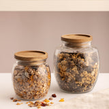 KILNER universal storage jar with clear glass body and metal screw lid, ideal for preserving and organizing kitchen supplies.
