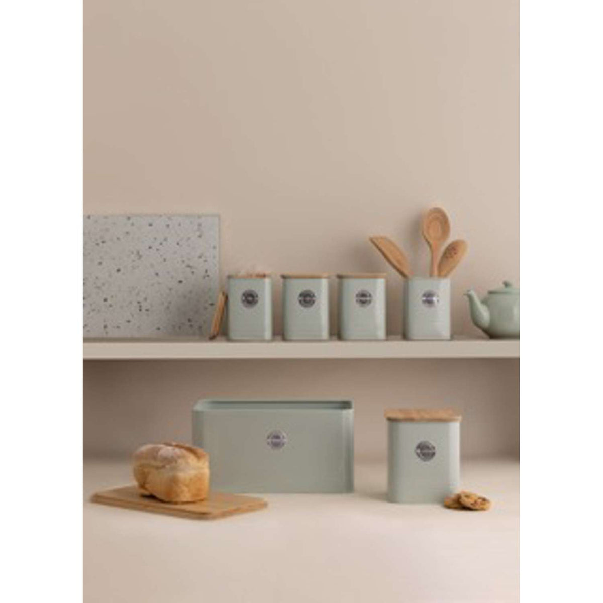 TYPHOON SQUIRCLE mint storage container with a transparent body and mint-colored lid for kitchen organization.