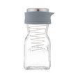 KILNER 500ml clear dressing shaker with lid and measurements for easy mixing and pouring salad dressings and sauces.