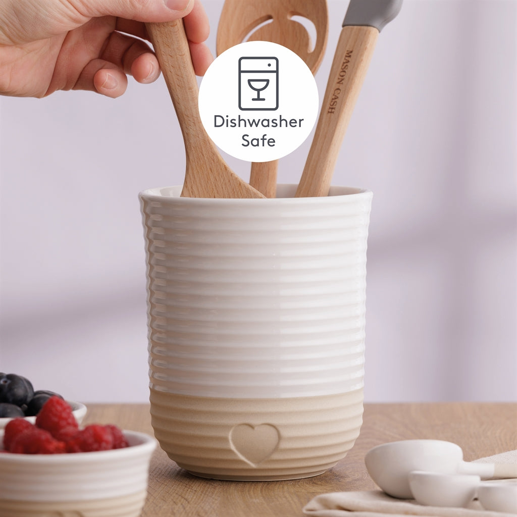 Mason Cash rustic charm beige utensil holder with a textured ceramic finish, ideal for kitchen utensil organization.