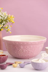 Transparent Mason Cash mixing bowl with "In the Meadow" design, featuring a clear, durable ceramic construction.