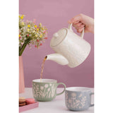 Mason Cash In The Meadow white teapot with 2 matching teacups, decorated with floral meadow design, ceramic tea set.