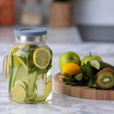 Clear 1.2L KILNER glass jug with a wide mouth and sturdy handle, ideal for serving beverages or storing liquids.