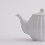 P & K Teekanne in taubenblau with two matching tea cups, ceramic set for brewing and serving tea.
