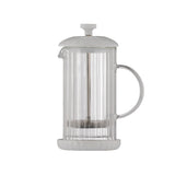 P & K French Press Luxe in white with glass carafe and stainless steel handle for brewing coffee or tea.
