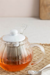 Clear P & K PRICE & KENSINGTON Luxe teapot with lid, made of glass, showcasing a sleek, modern design.