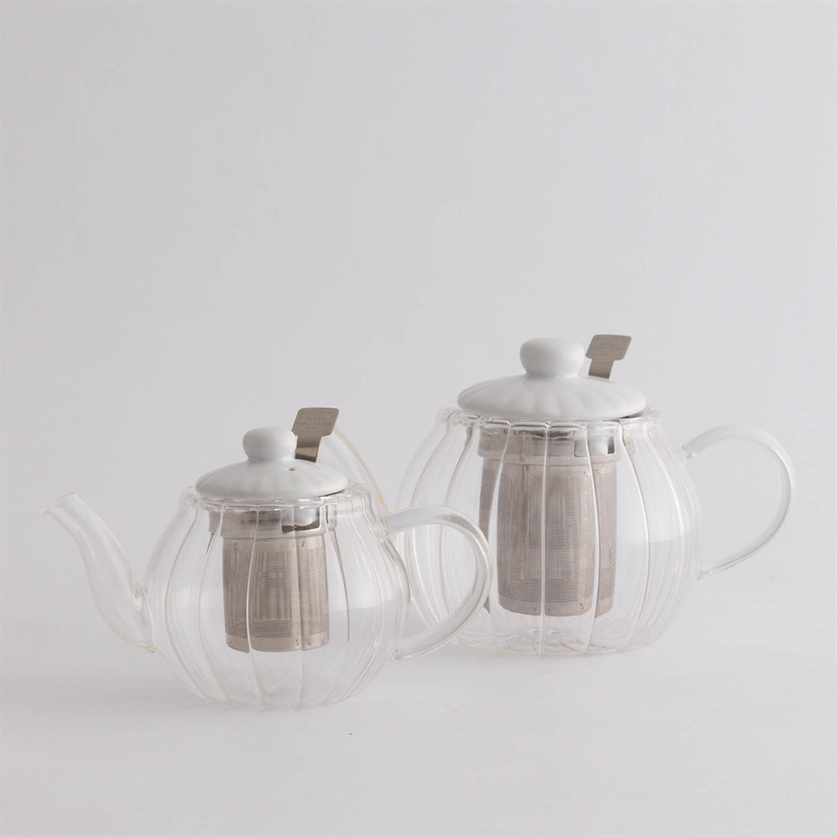 Clear P & K PRICE & KENSINGTON LUXE teekanne with elegant design and glass body for brewing and serving tea.