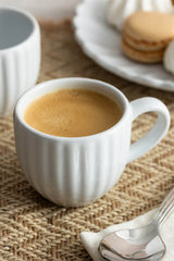 Price & Kensington Tassen Luxe white 85ml ceramic cup with elegant design, ideal for tea or coffee.