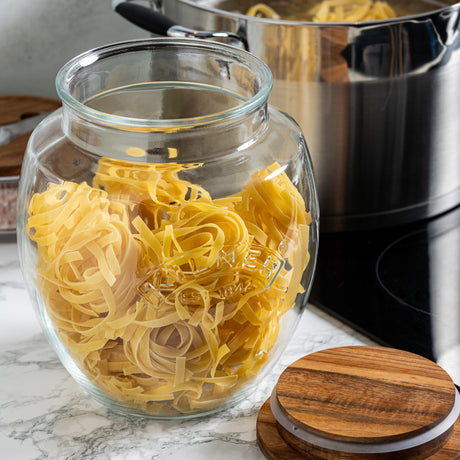 KILNER storage jar with acacia wood lid, clear glass container for kitchen storage, showcasing the wooden lid and transparent body.