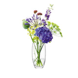 Clear glass LSA Flower Barrel bouquet vase, 20cm tall with a rounded design, ideal for floral arrangements.