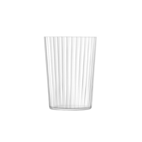 Set of four clear LSA GIO LINE tumblers, 560ml each, made of glass, perfect for beverages, shown in a natural setting.