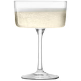 Set of four clear LSA Gio champagne and cocktail glasses, 230ml capacity, elegant design, perfect for serving drinks.