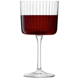 Set of four clear LSA GIO LINE wine glasses, 250ml capacity, elegant design for enjoying wine.