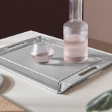 FREEFORM DUO tablett in gray and black with a sleek, modern design, featuring two compartments for organized storage.