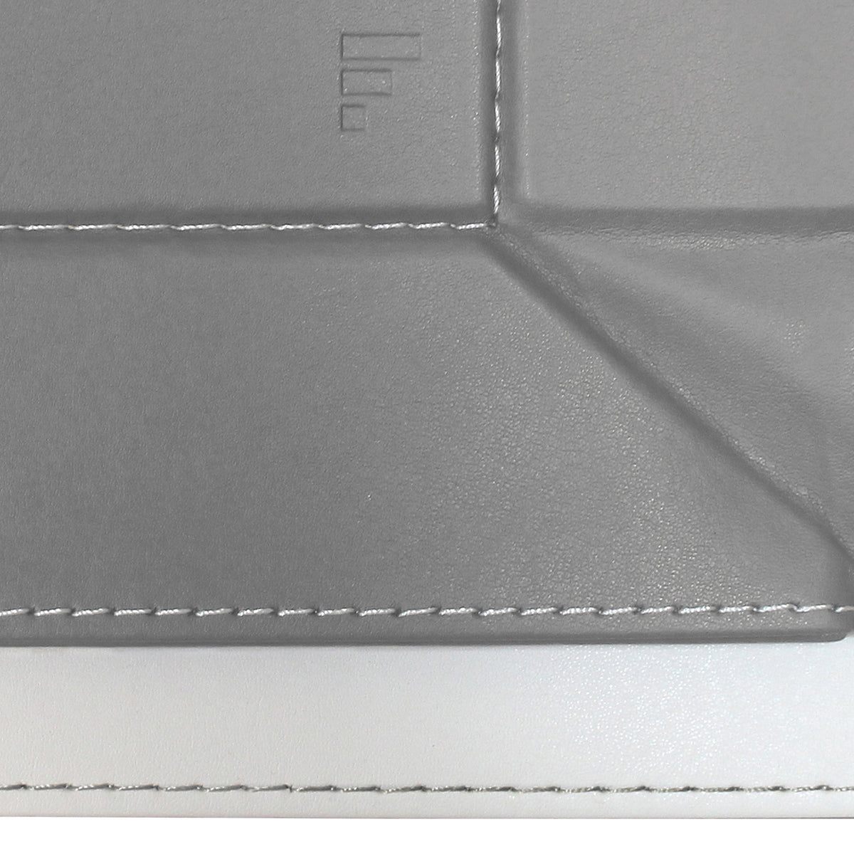 FREEFORM DUO tablet tray in gray and white, showing a sleek, modern design with two separate compartments for organization.