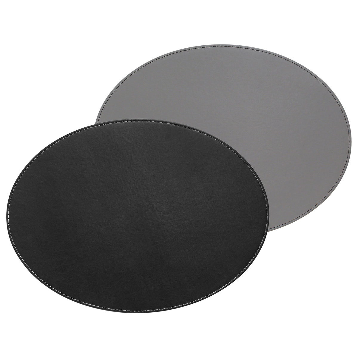 FREEFORM Platzset DUO, oval black and gray table placemats with a modern design, perfect for enhancing dining table aesthetics.