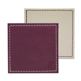 Set of four FREEFORM DUO coasters with modern design, made of durable material, perfect for protecting surfaces from drink condensation.