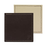FREEFORM DUO 4-piece coaster set with stylish, durable cork and silicone surfaces for protecting tables.