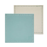 Set of four FREEFORM DUO coasters with modern design, made of durable material, perfect for protecting surfaces from drink spills.