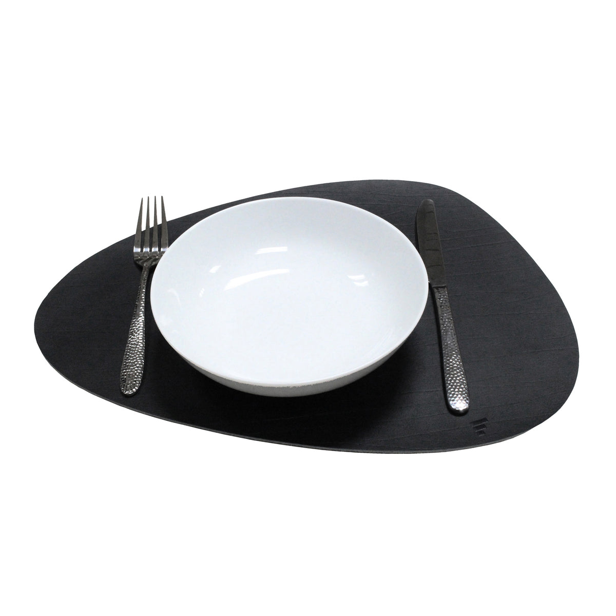 FREEFORM Platzset KIESEL in black, 43 x 30 cm, featuring a modern design for table protection and decoration.