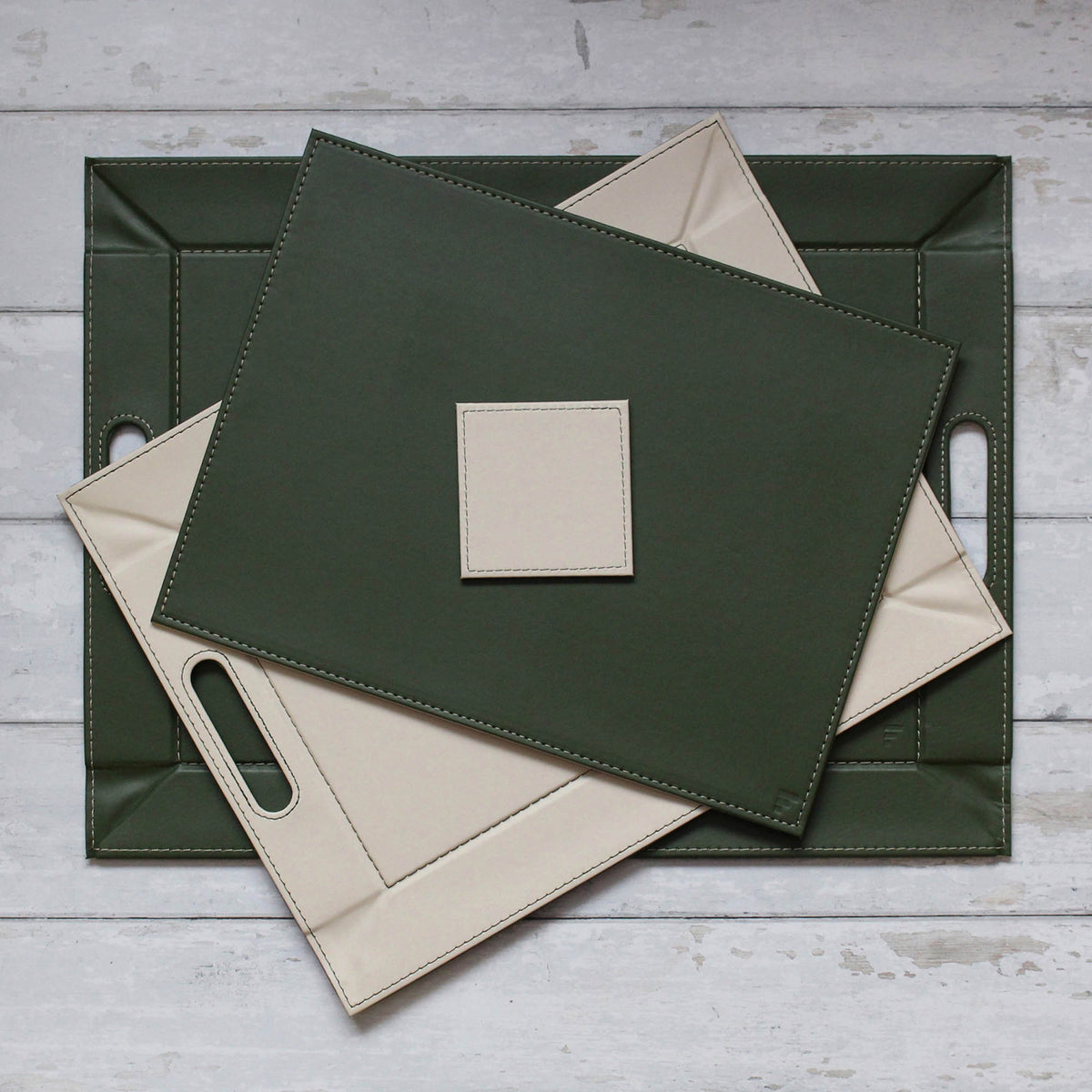 FREEFORM DUO coaster set with four stylish, round cork-backed drink underlays for protecting surfaces.