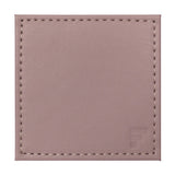 Set of four FREEFORM DUO coasters with modern design, made of durable material, perfect for protecting surfaces from drinks.