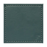 FREEFORM DUO 4-piece set of coaster underlays with modern design, perfect for protecting surfaces from drink spills.