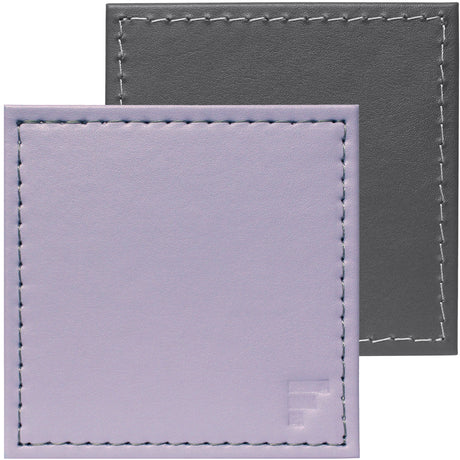 FREEFORM DUO 4-piece coaster set with stylish, durable cork and silicone design, perfect for protecting surfaces from hot or cold drinks.