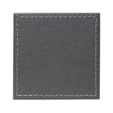 Set of four FREEFORM DUO coasters with modern design, made of durable materials, perfect for protecting surfaces.
