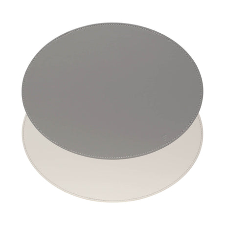FREEFORM Platzset DUO in gray and white with oval shape, featuring a modern design for dining table protection and decoration.