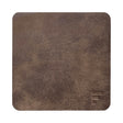 FREEFORM FLEXI leather-look coaster set with four round drink coasters on a wooden table.