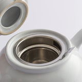 White P & K Kensington teapot with a classic design, showcasing a smooth, rounded ceramic body and curved handle.