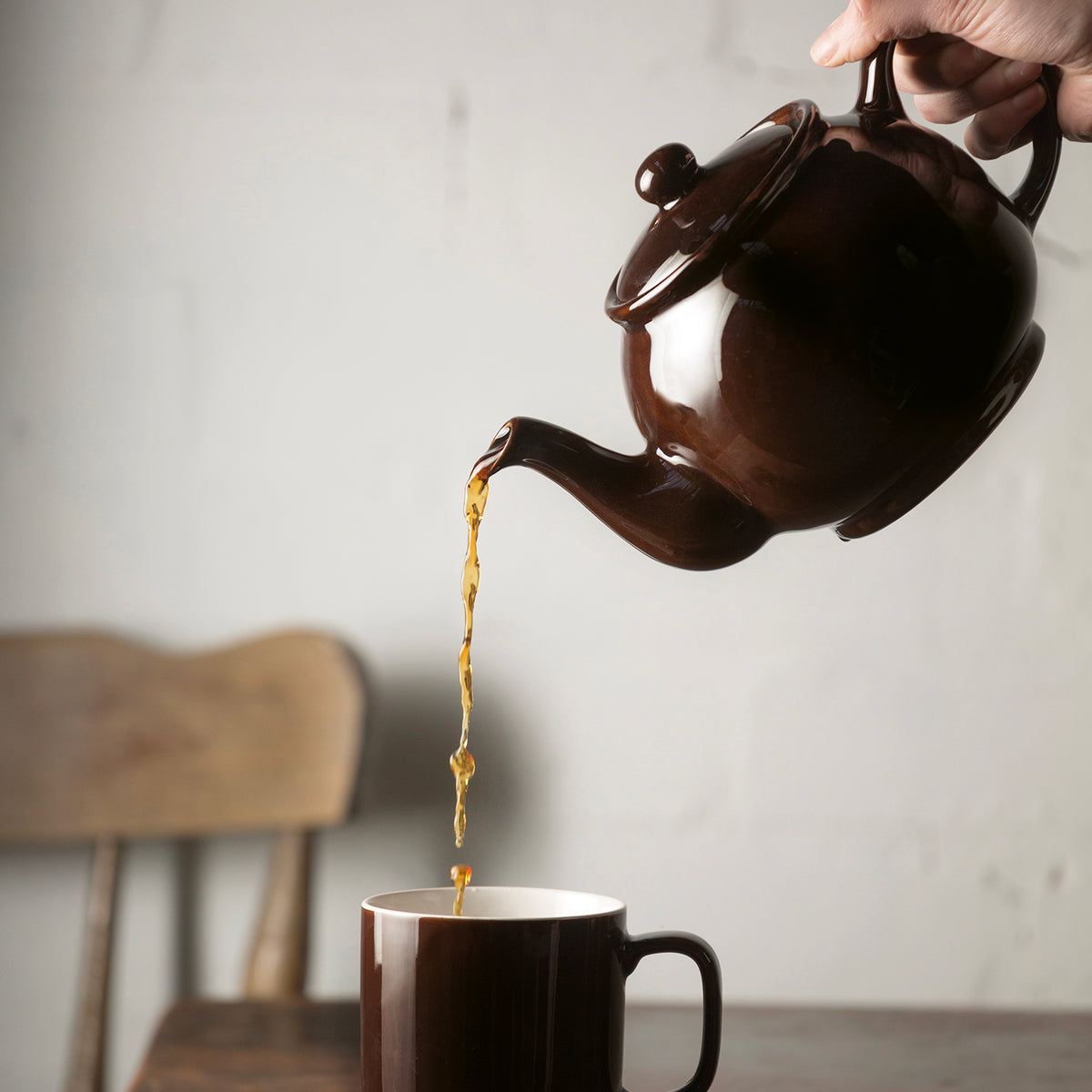 Brown teapot from PRICE & KENSINGTON P & K, featuring a classic design, displayed on a neutral background.