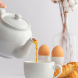 White P & K Kensington teapot with a classic design, featuring a smooth body and a curved handle for serving tea.