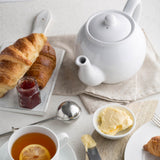 White P & K Kensington teapot with a classic design, featuring a smooth handle and spout, on a plain background.