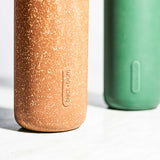BLACK+BLUM TO-GO GLAS water bottle in ocean color, 600ml, with sleek design and clear glass construction.
