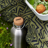 Black+Blum Classic 600ml reusable water bottle with black cap and sleek design, ideal for daily hydration.